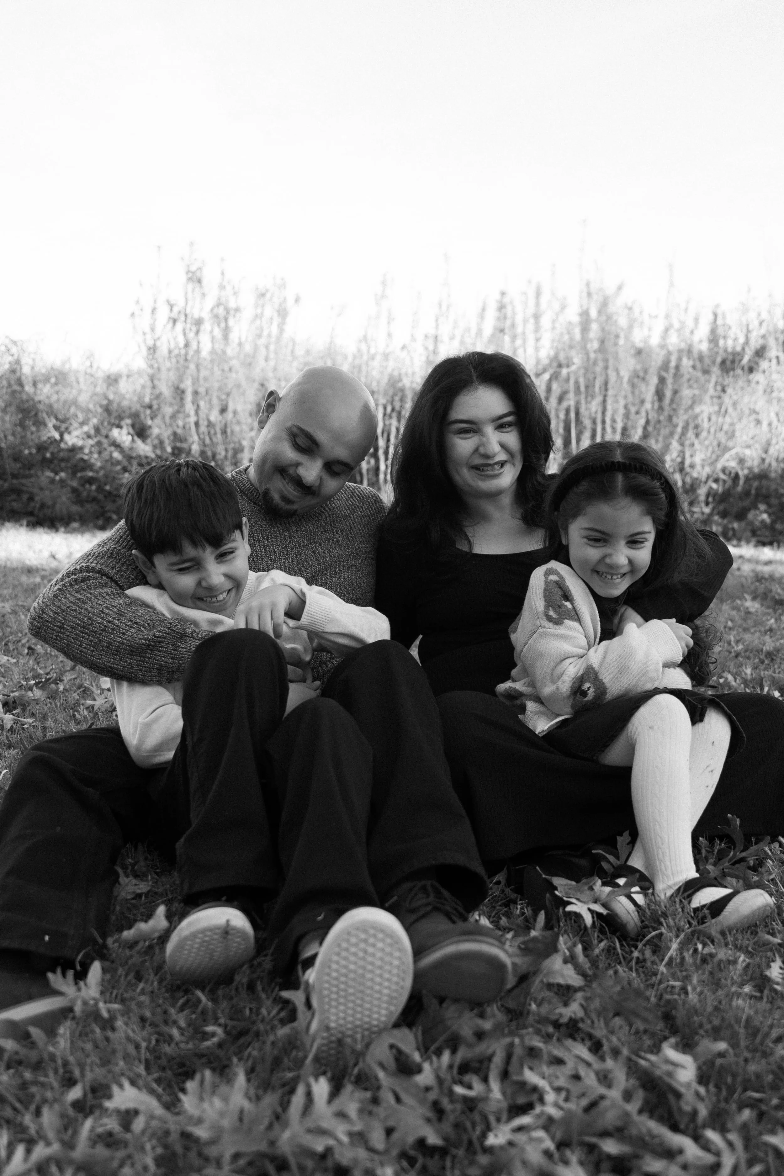Family laughing together during lifestyle session